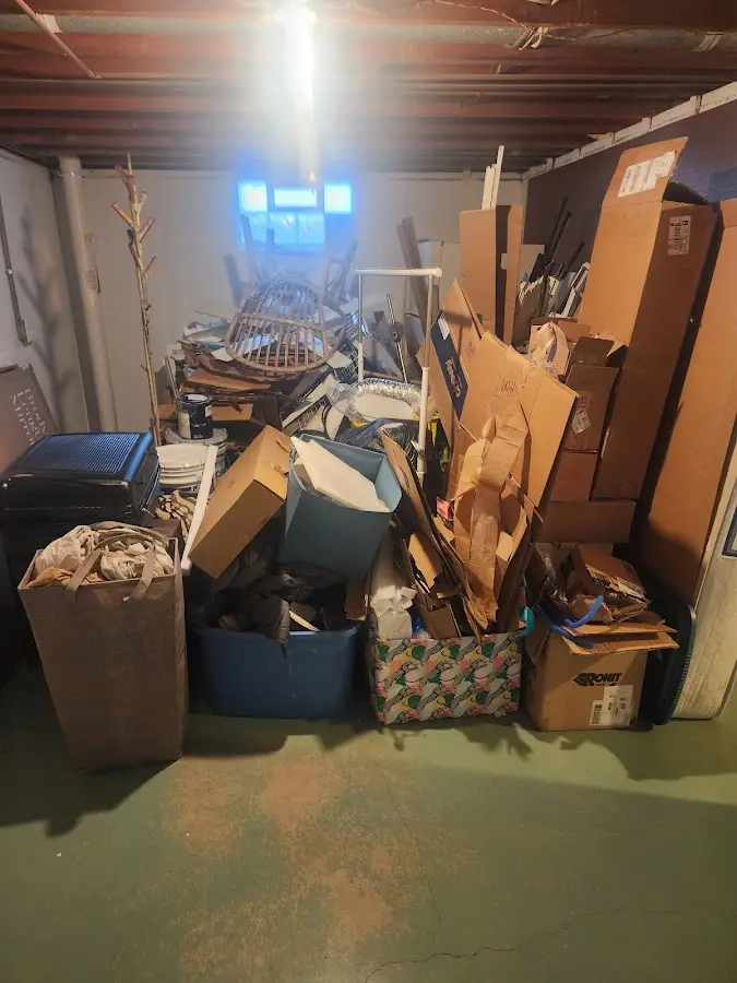 Roll-off dumpster container at job site for Cleanout Dumpster Rental in Edgartown